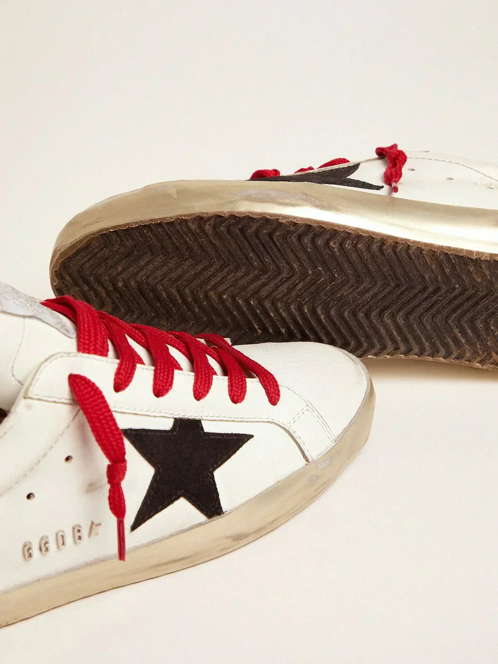 Super-Star sneakers with leopard-print heel tab and red laces