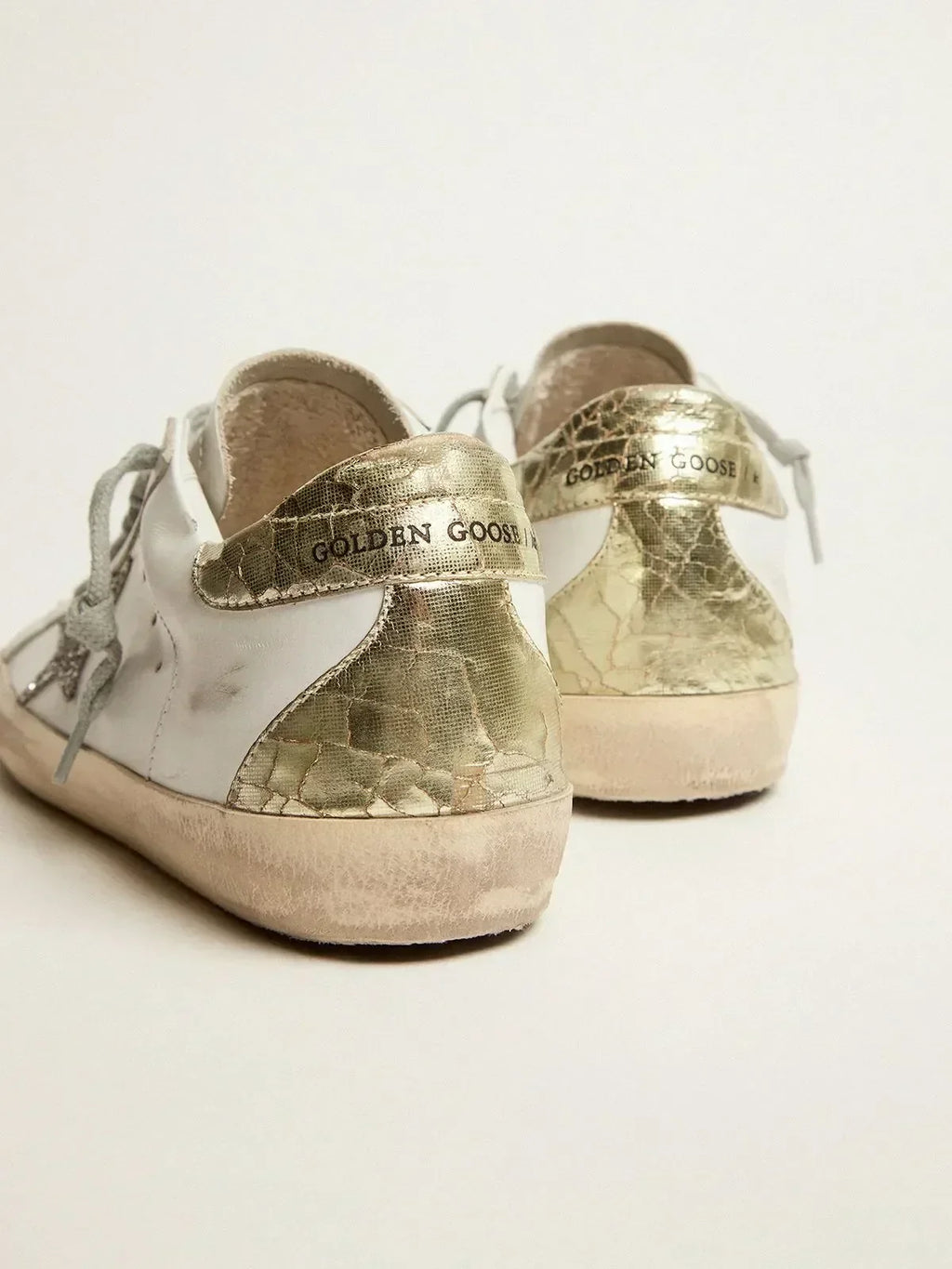 Super-Star sneakers with silver glitter star and glossy gold leather heel tab