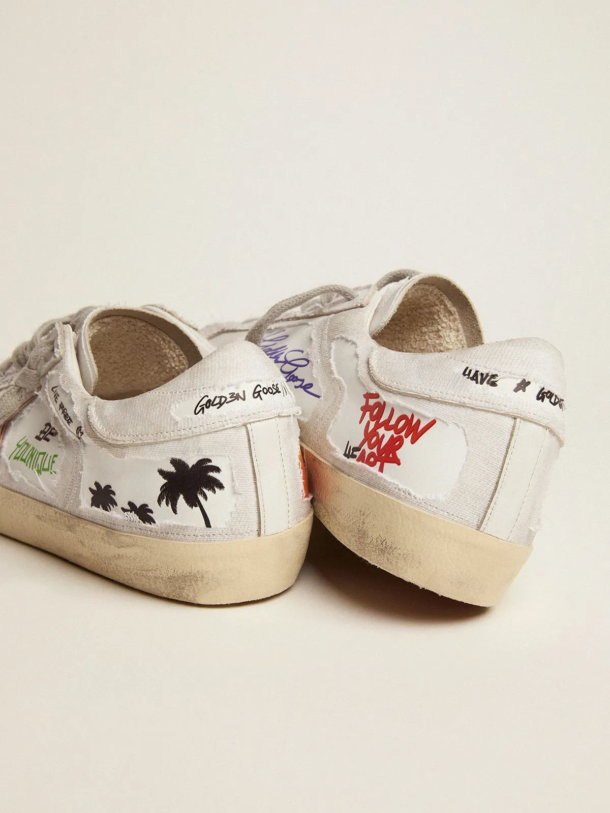 Super-Star Dream Maker sneakers in white color with reverse construction and hidden multicolor details