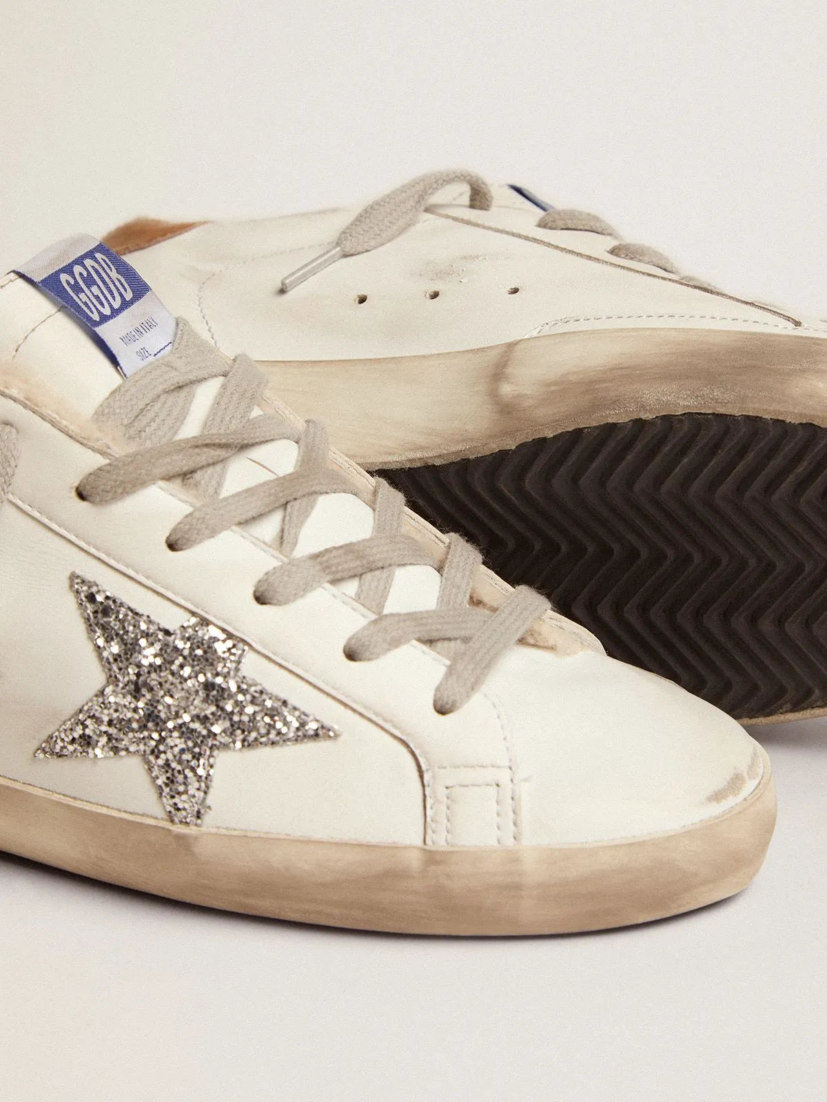 Super-Star sneakers with shearling lining. silver glitter star and lizard-print dove-gray leather heel tab