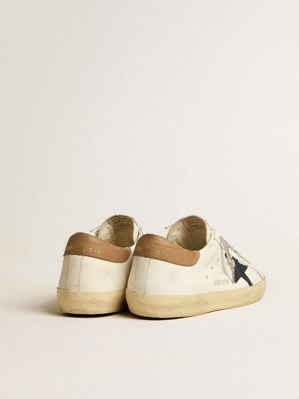 Super-Star with blue canvas star and tobacco leather heel tab