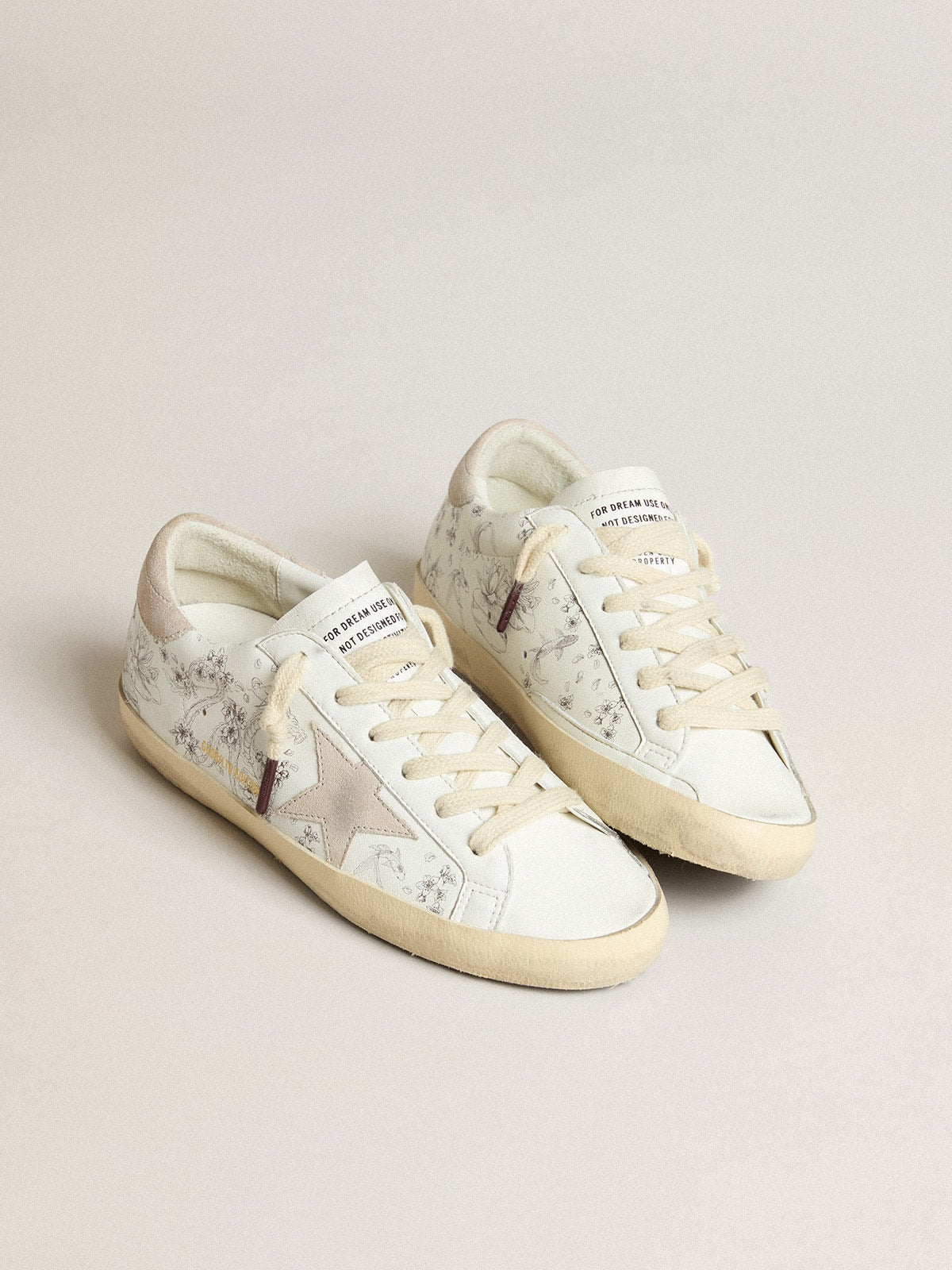 Men’s Super-Star LTD CNY in white leather with lettering on the upper