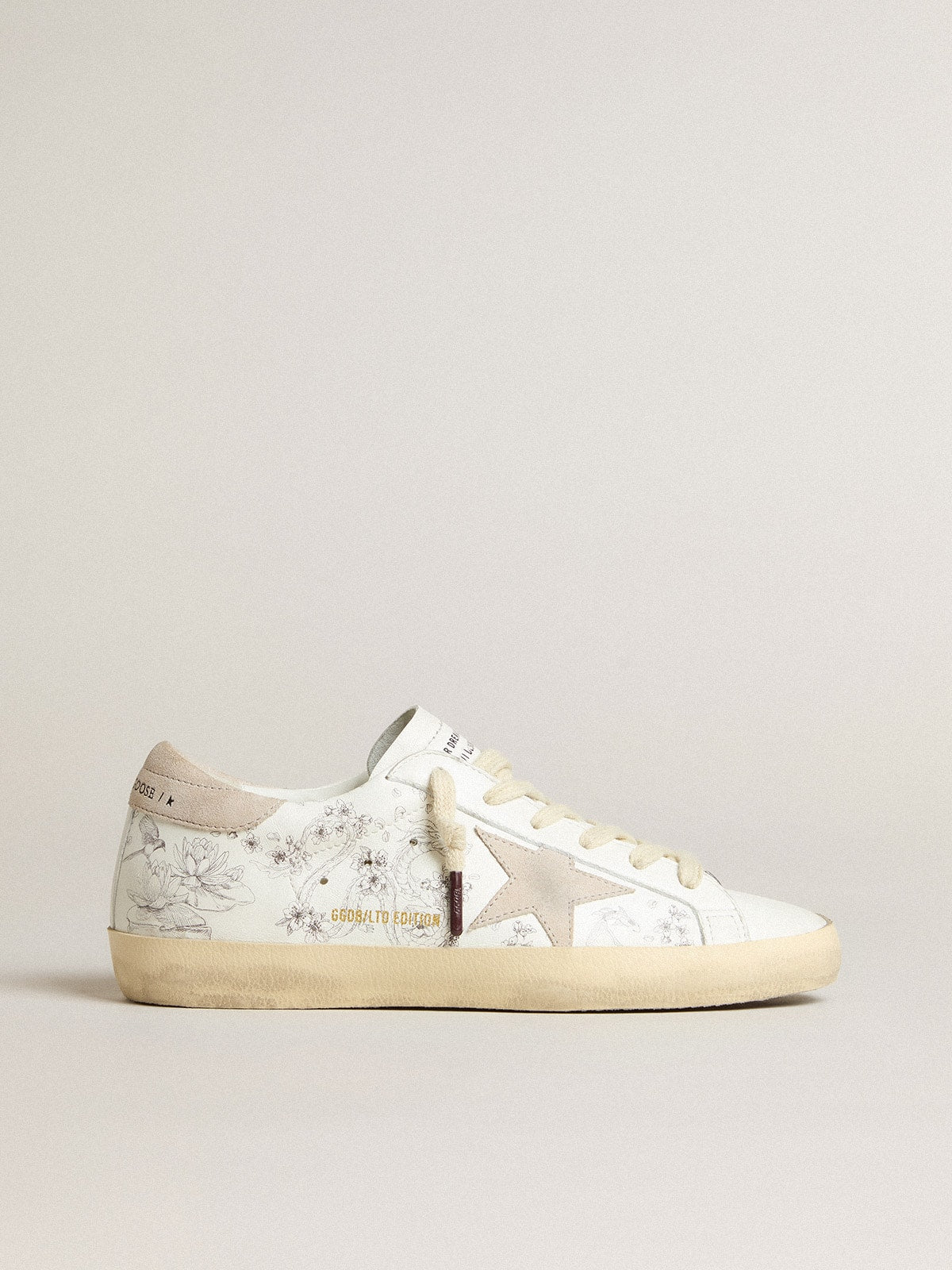 Men’s Super-Star LTD CNY in white leather with lettering on the upper