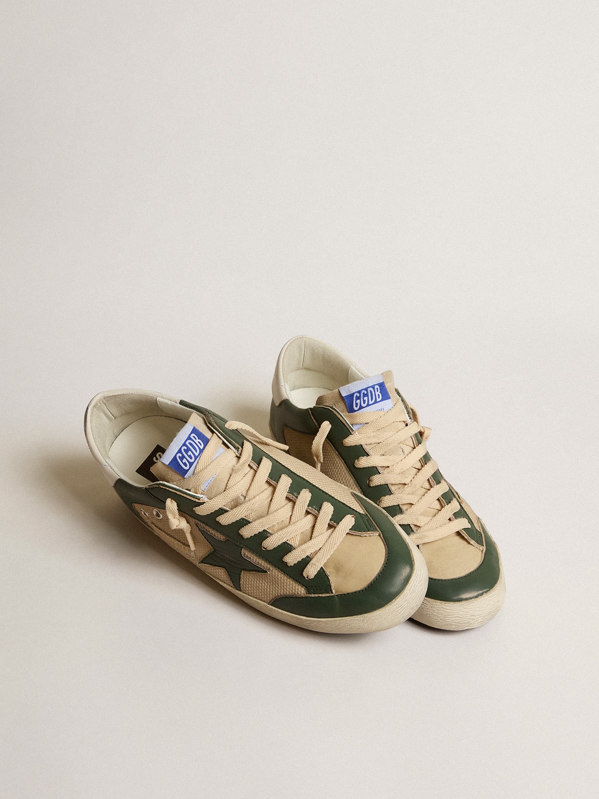 Men's Super-Star LTD in cream mesh and green nappa with nappa star