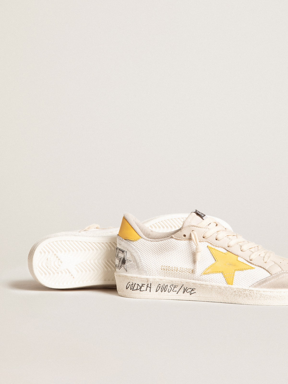 Ball Star LTD in white mesh with yellow leather star and heel tab