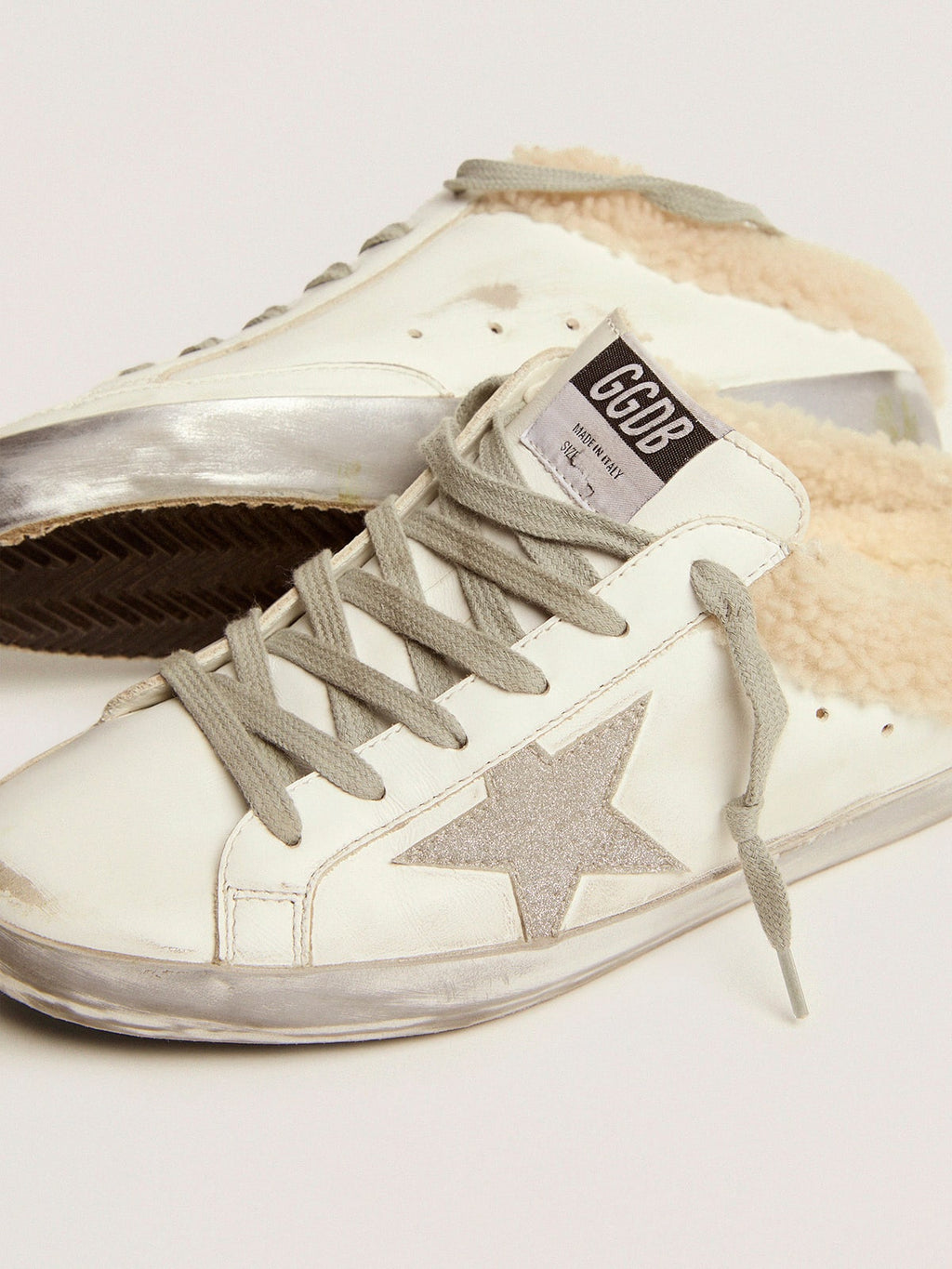 Super-Star Sabots in white leather with shearling lining