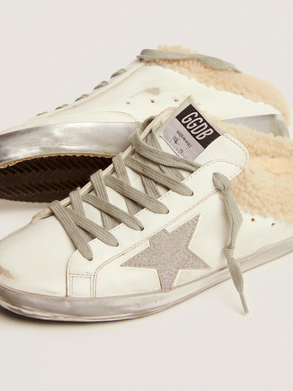 Super-Star Sabots in white leather with shearling lining
