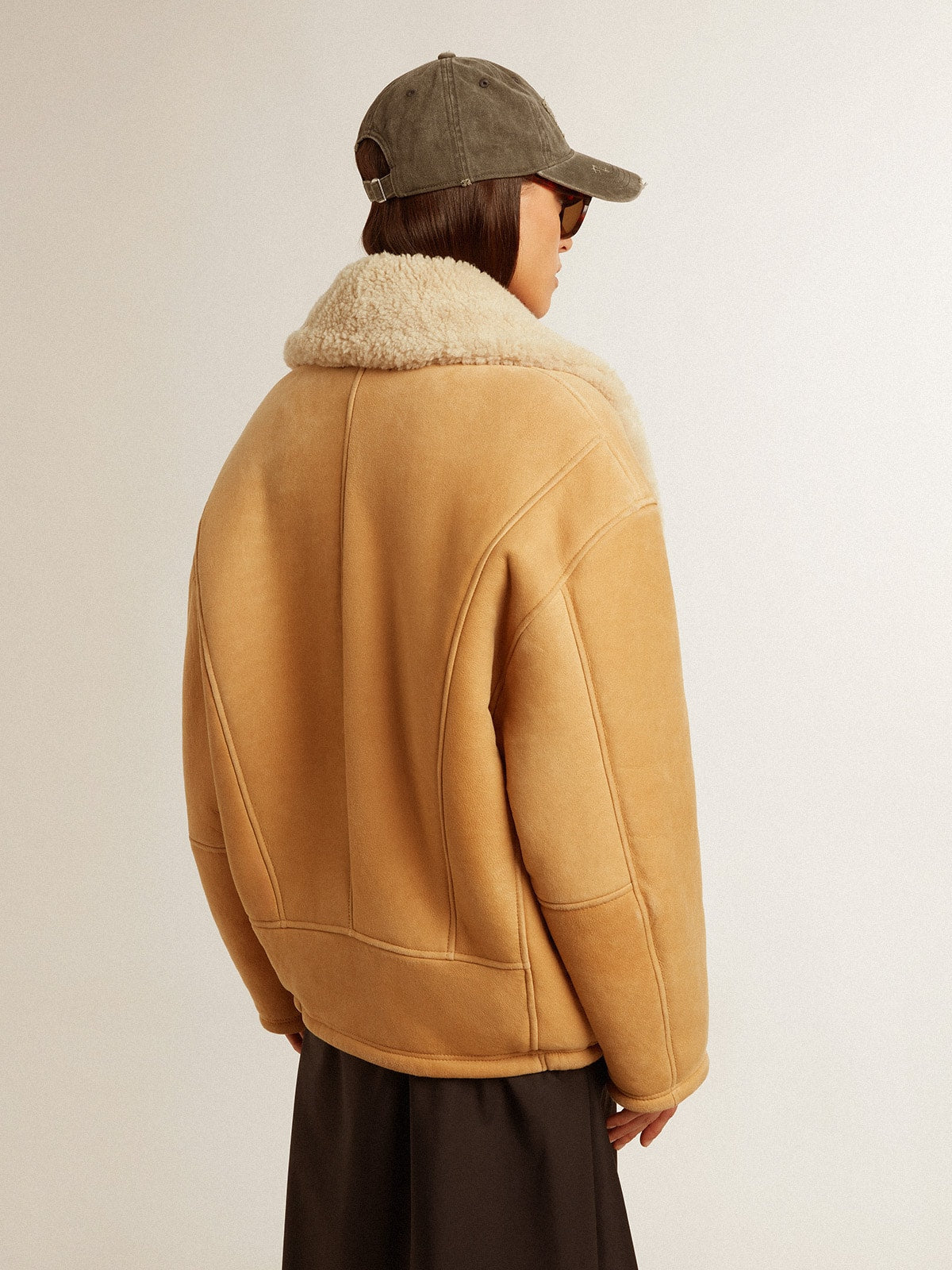 Women's sheepskin jacket with a wide shearling shawl collar